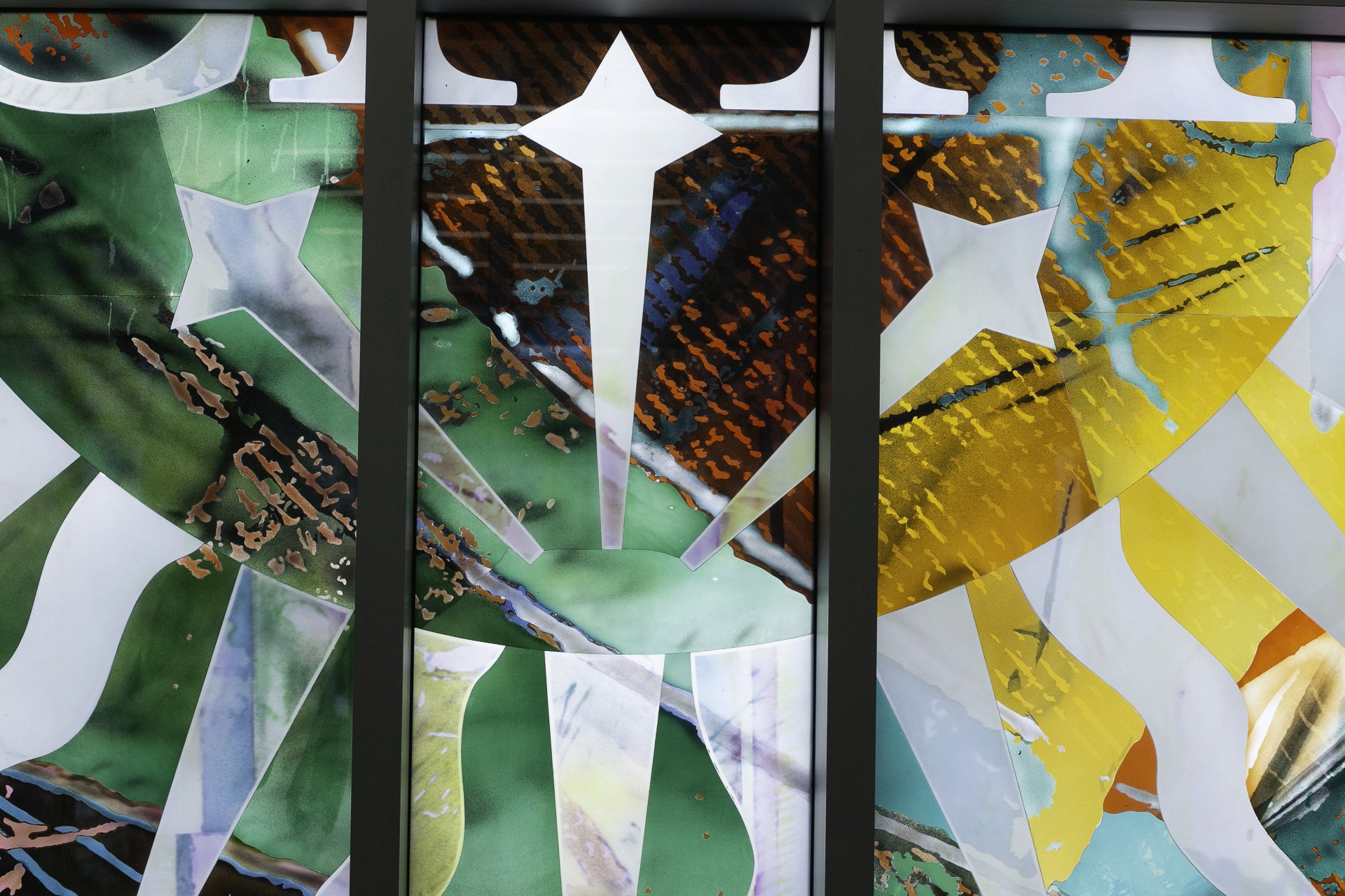 Contemporary stained glass detail combining symbolic color and texture for sacred architectural installation