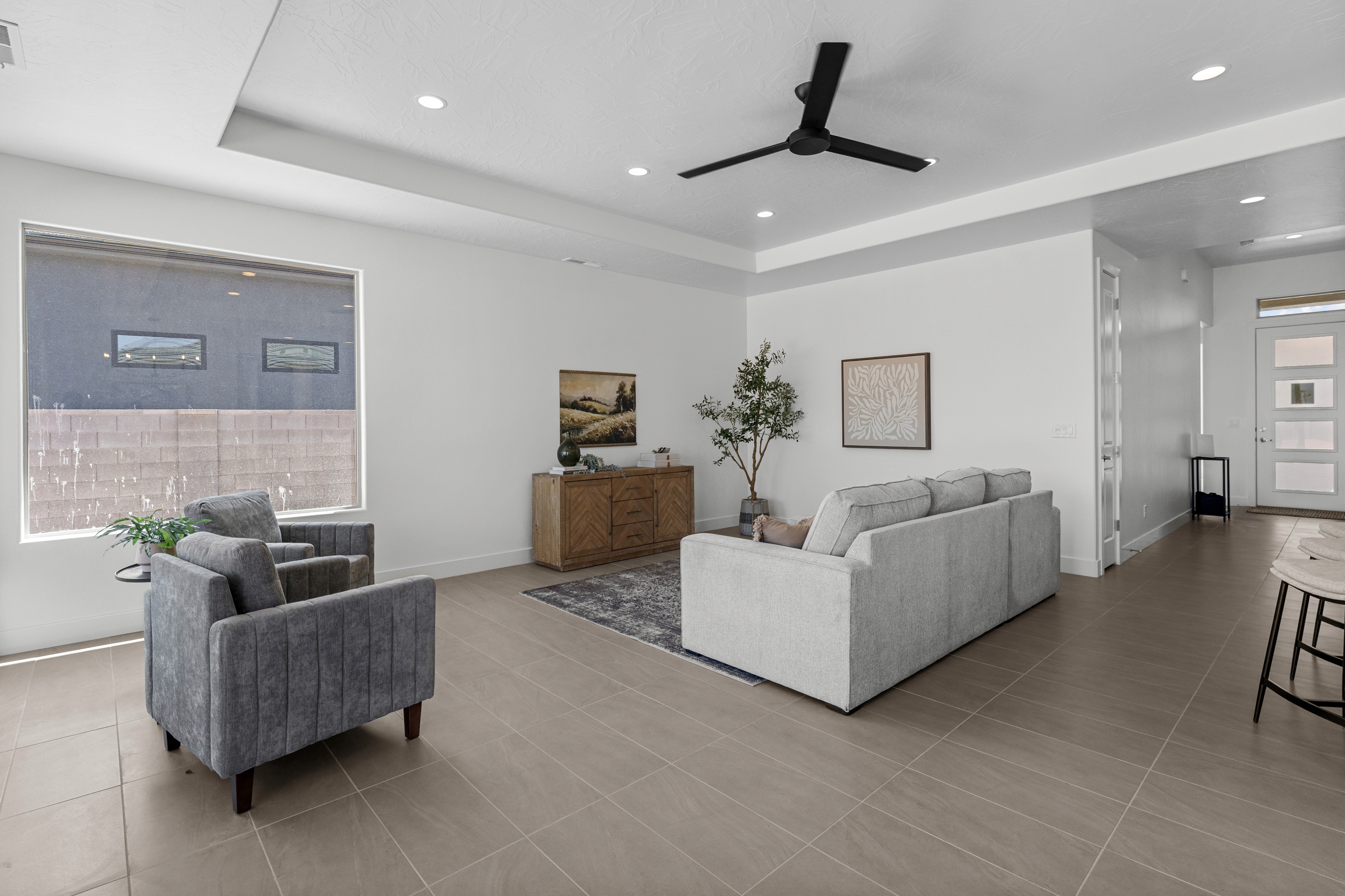 Living room of The Nest at Falcon Ridge custom home.