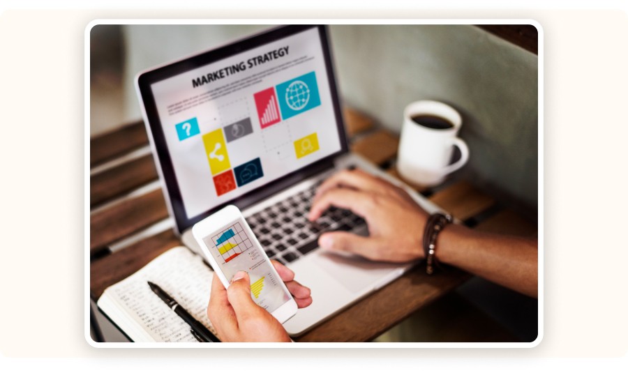 Laptop showing “Marketing Strategy”