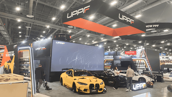 Detailed view of a 30x40 SEMA booth showing hero vehicle positioning, branded display surfaces, and automotive booth layout hierarchy