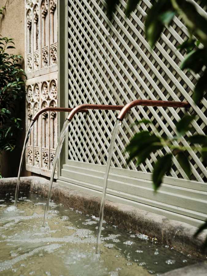 Elegant water fountain in a private Kensington garden