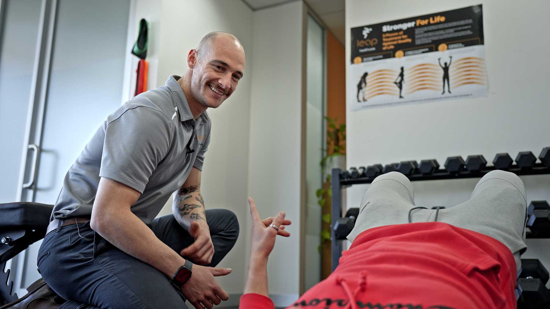 Daniel, Leap physiotherapist, assessing a patient's mobility