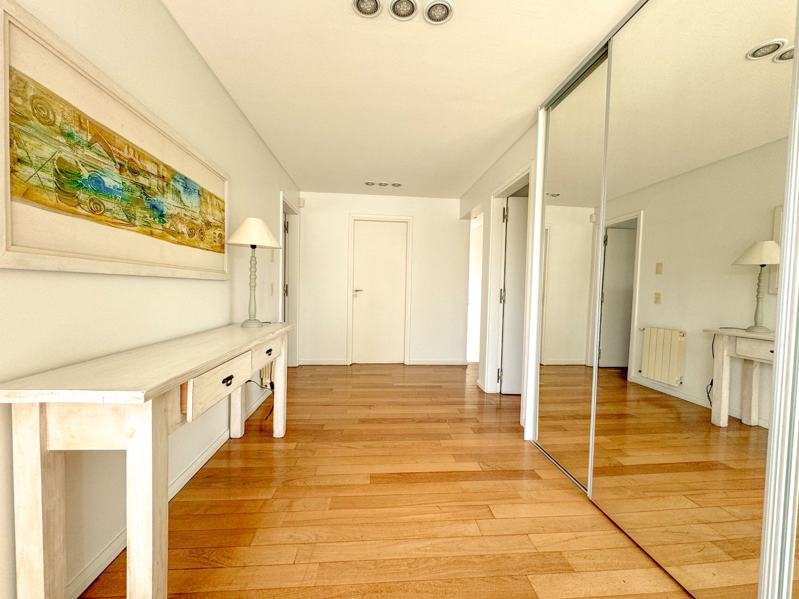 Large bedroom with suspended ceiling and lighting