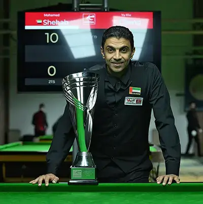 a snooker player and a trophy