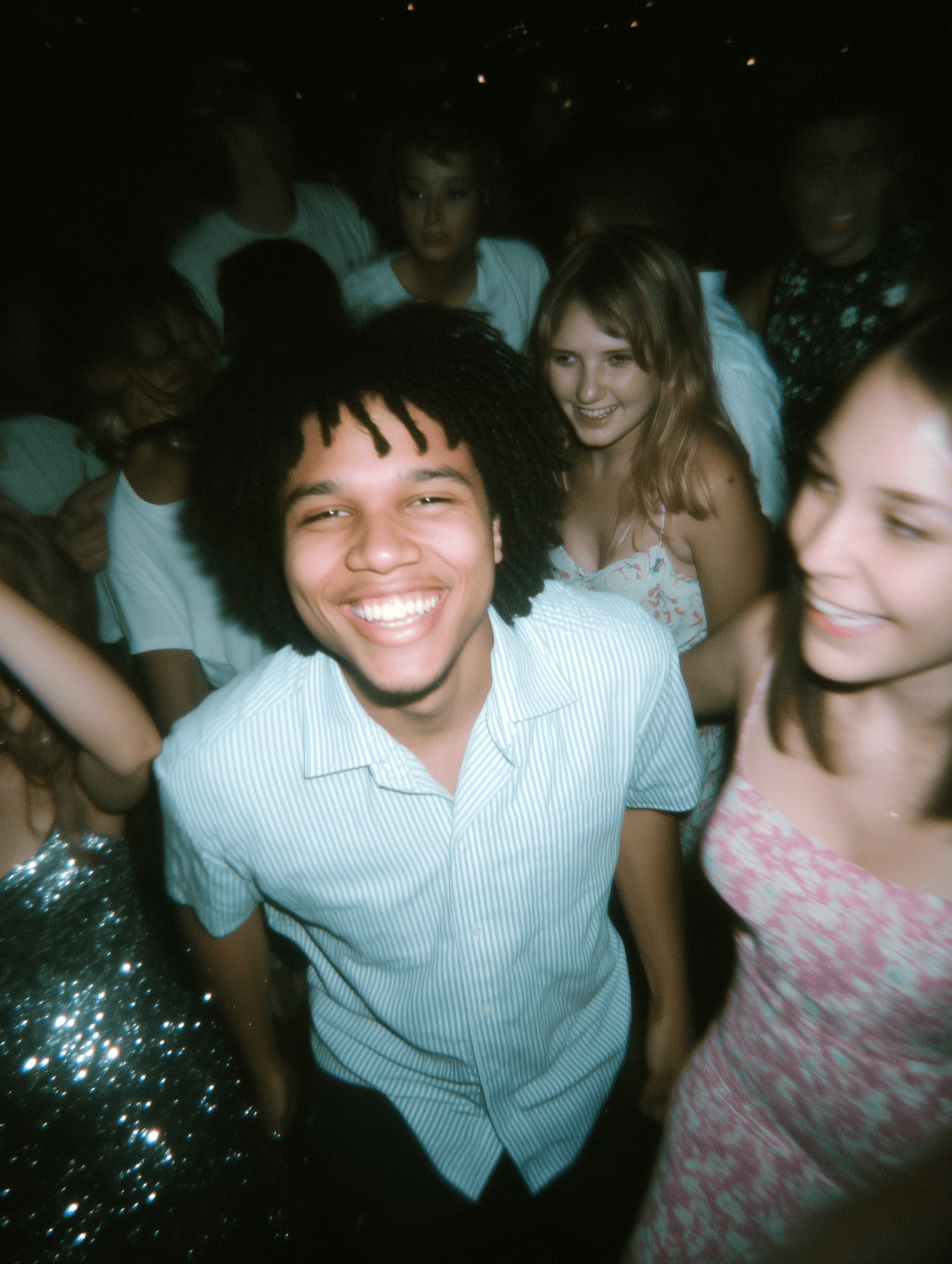 A group of people smiling together