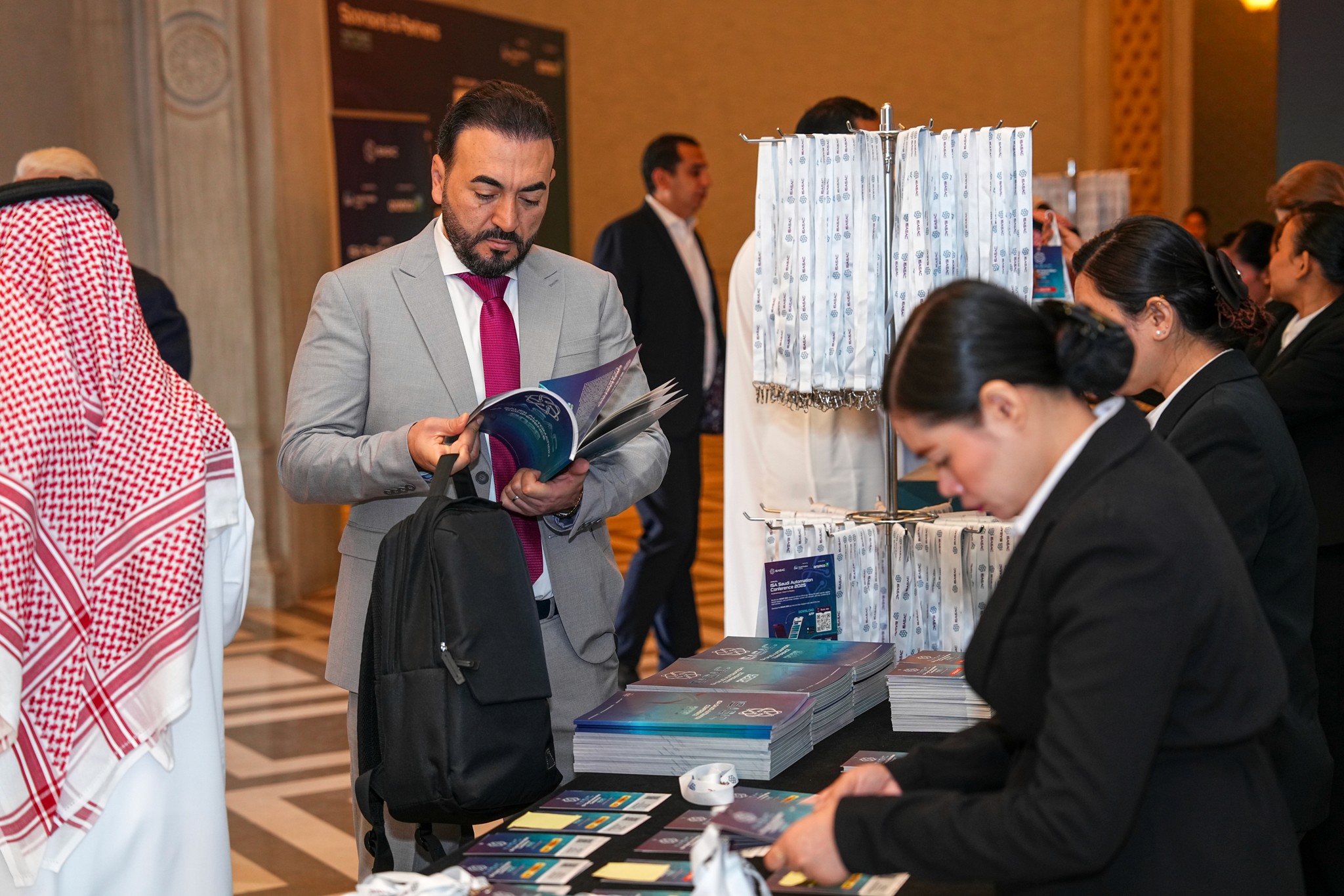 A Man Talking using Microphone in the Conference Room