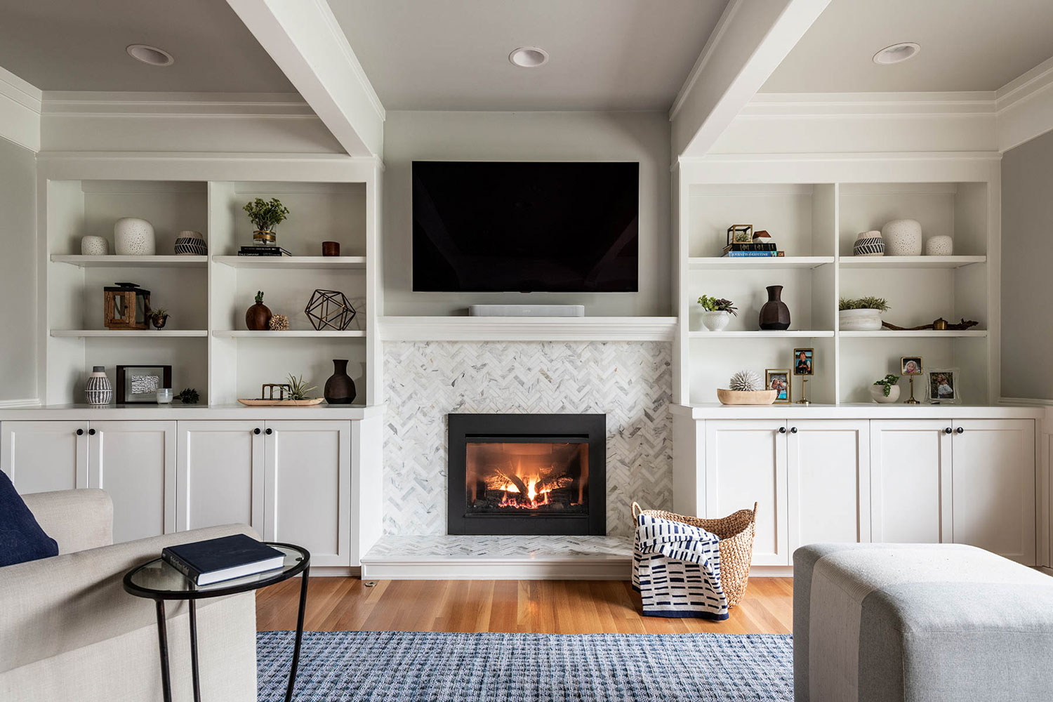 ThThe living room remodel of the Redmond House Remodel by interior design + professional organizing firm, Elegant Simplicity.