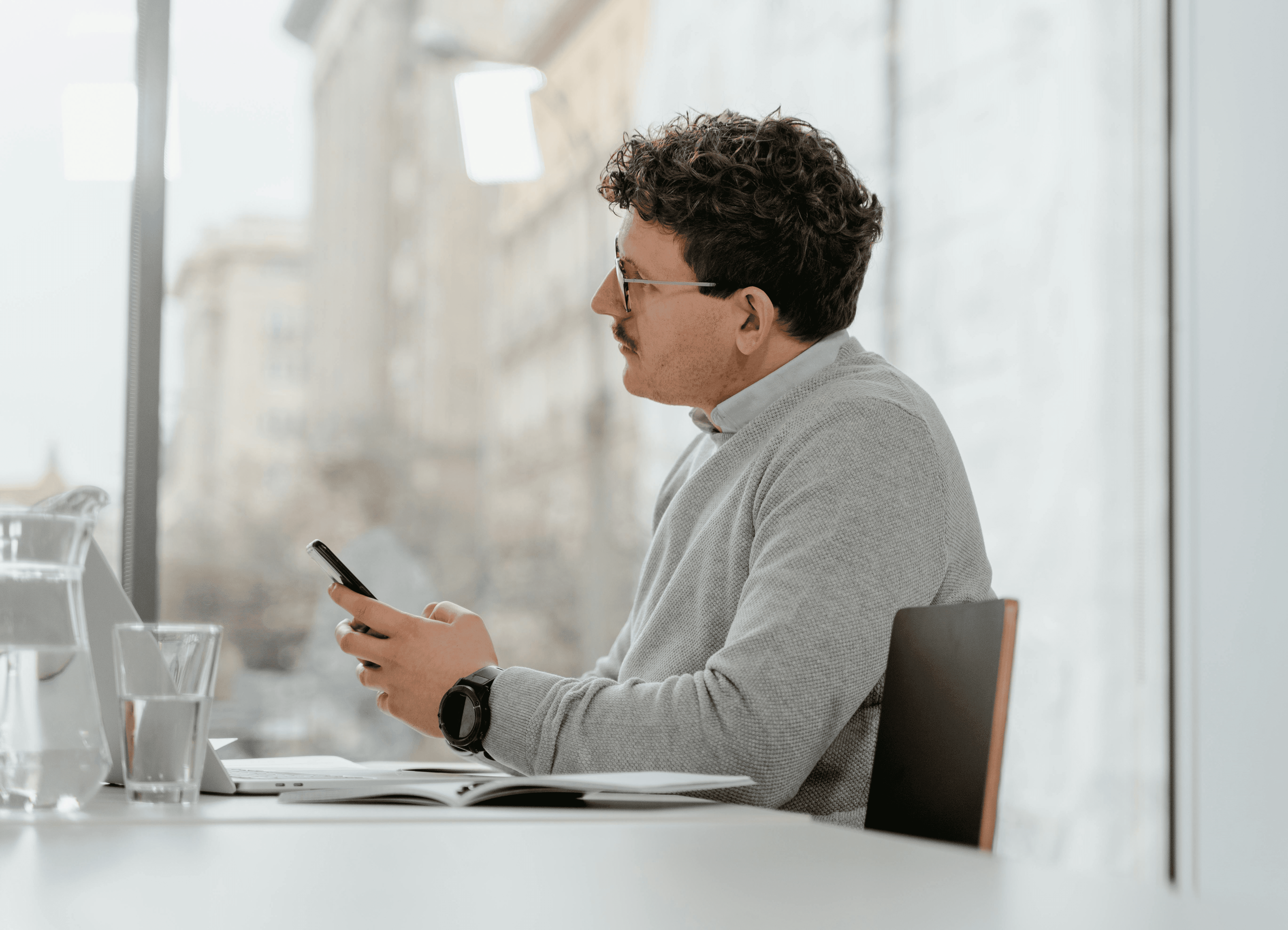 person sitting in a chair in front of a man