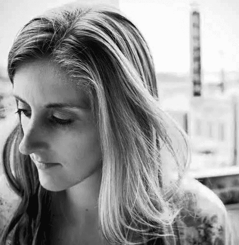 woman in white and blue checked dress shirt