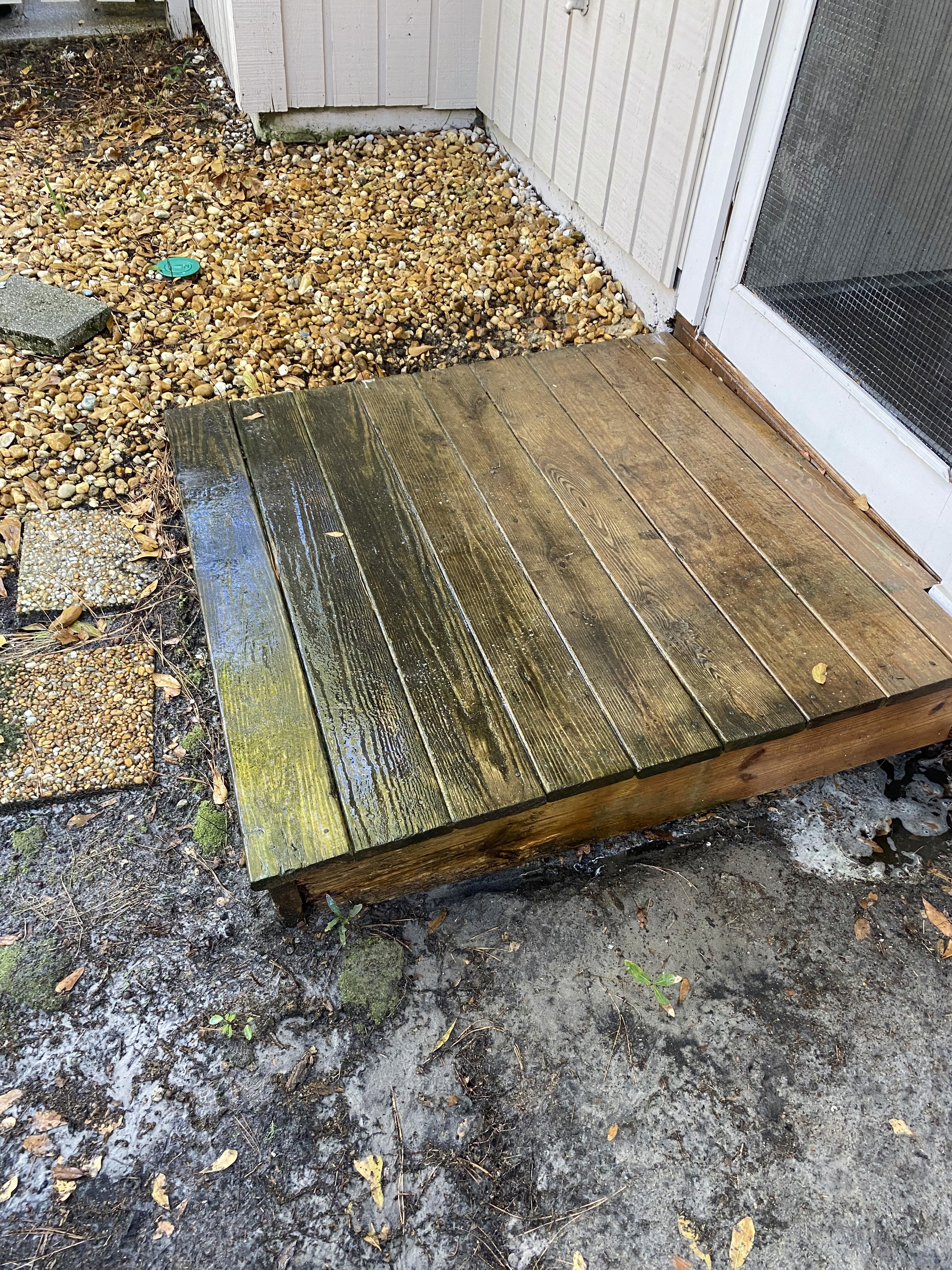 Before and after—home siding soft washed, surface free from algae and grime