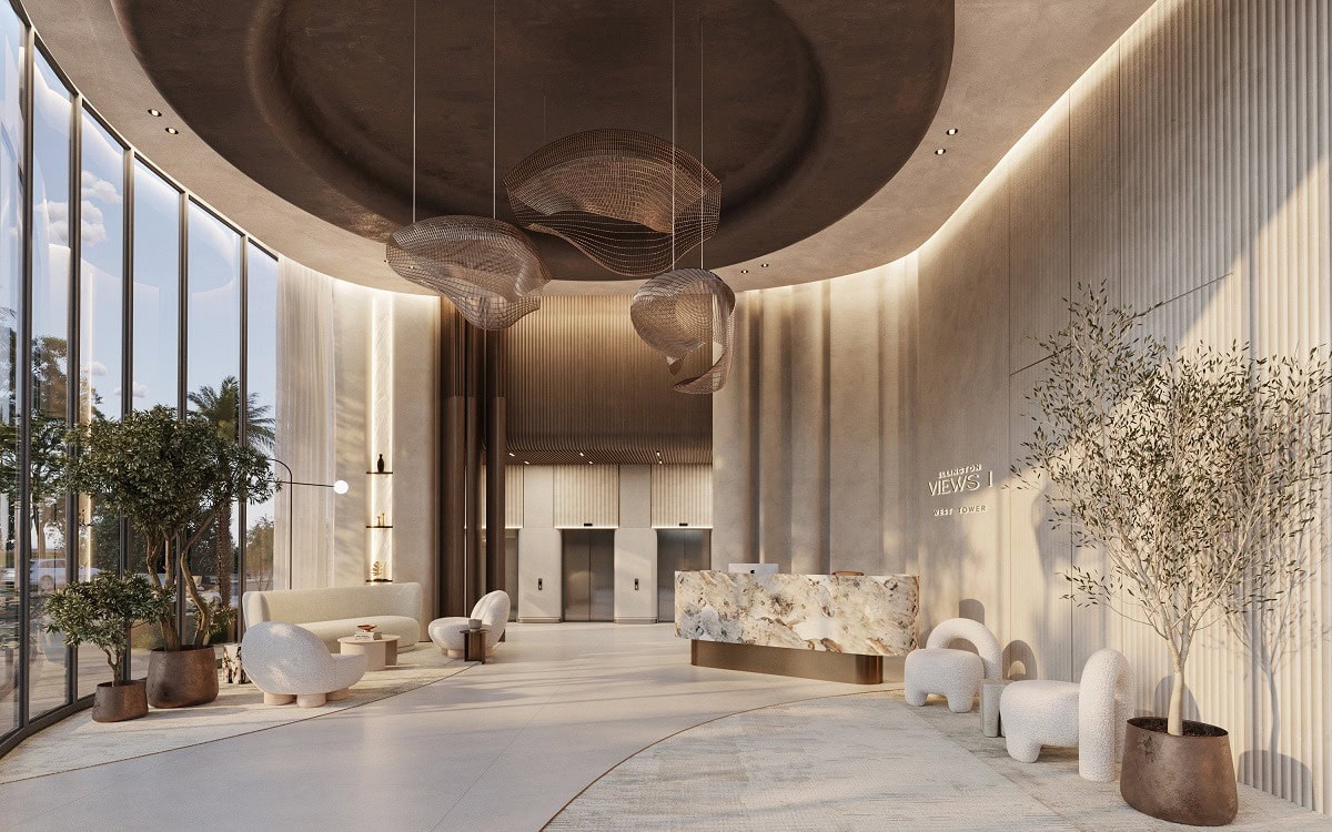 Modern lobby of Eltiera Views featuring large windows that allow natural light to fill the space.