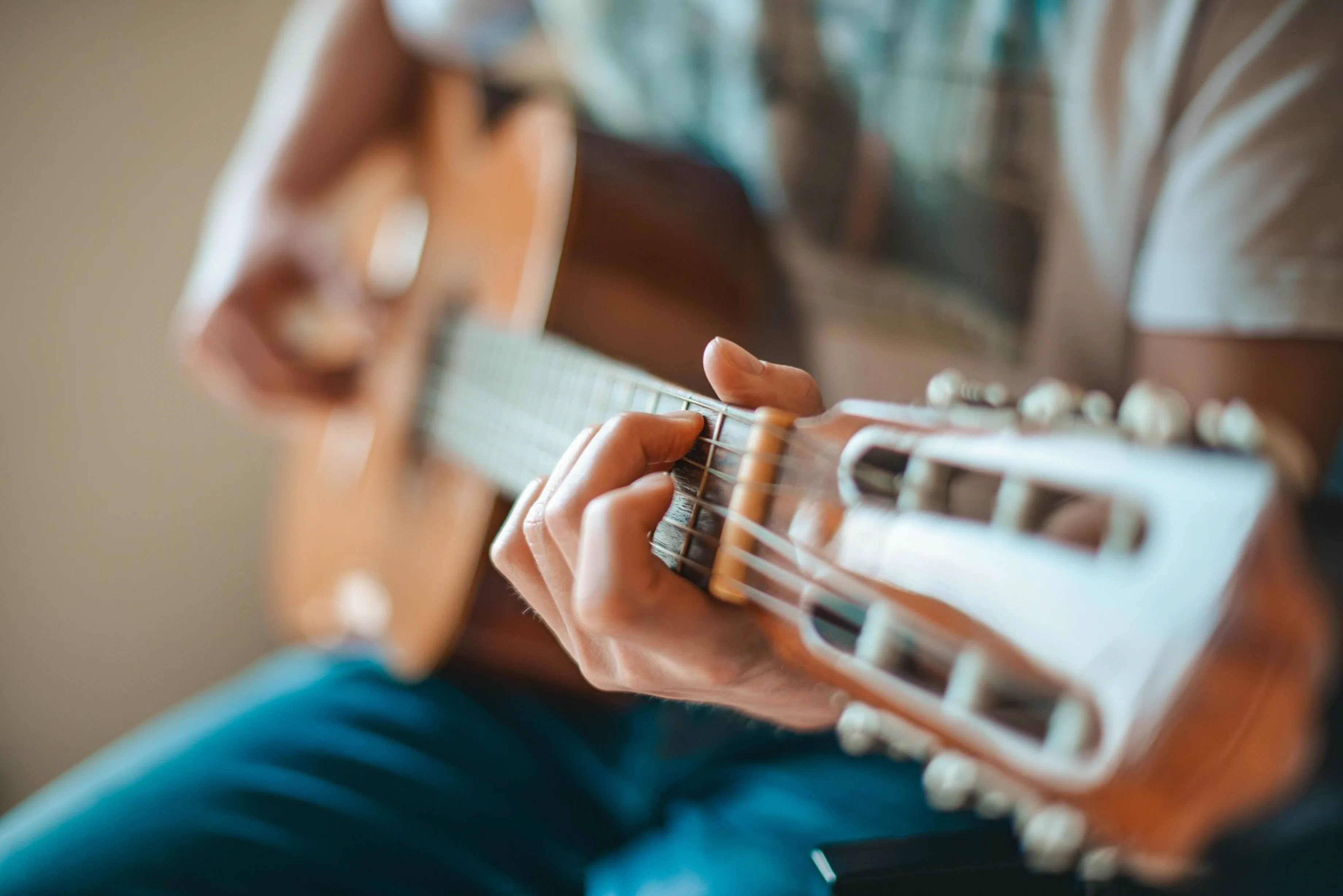 Student developing music skills during a lesson