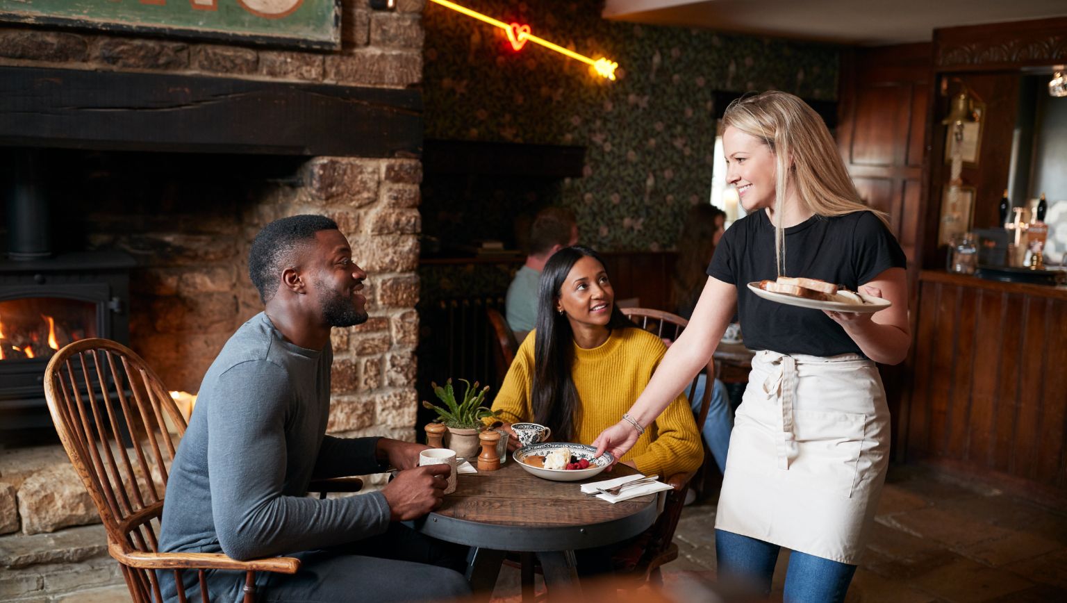 brown wooden kitchen cupboard near wall