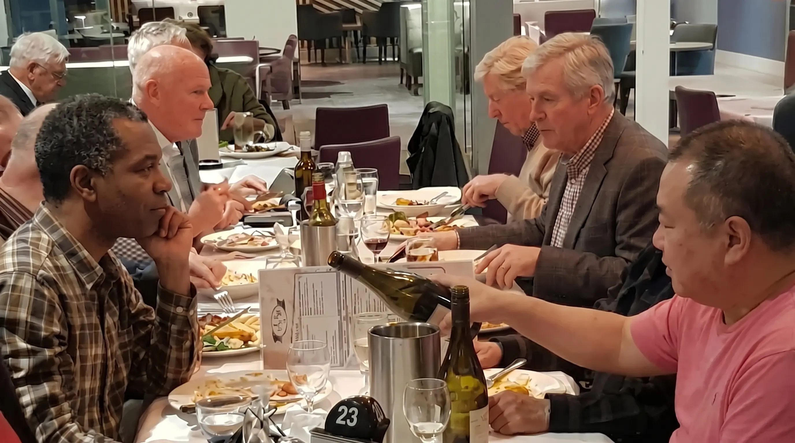 Laughing at jokes at Mingleo dinner