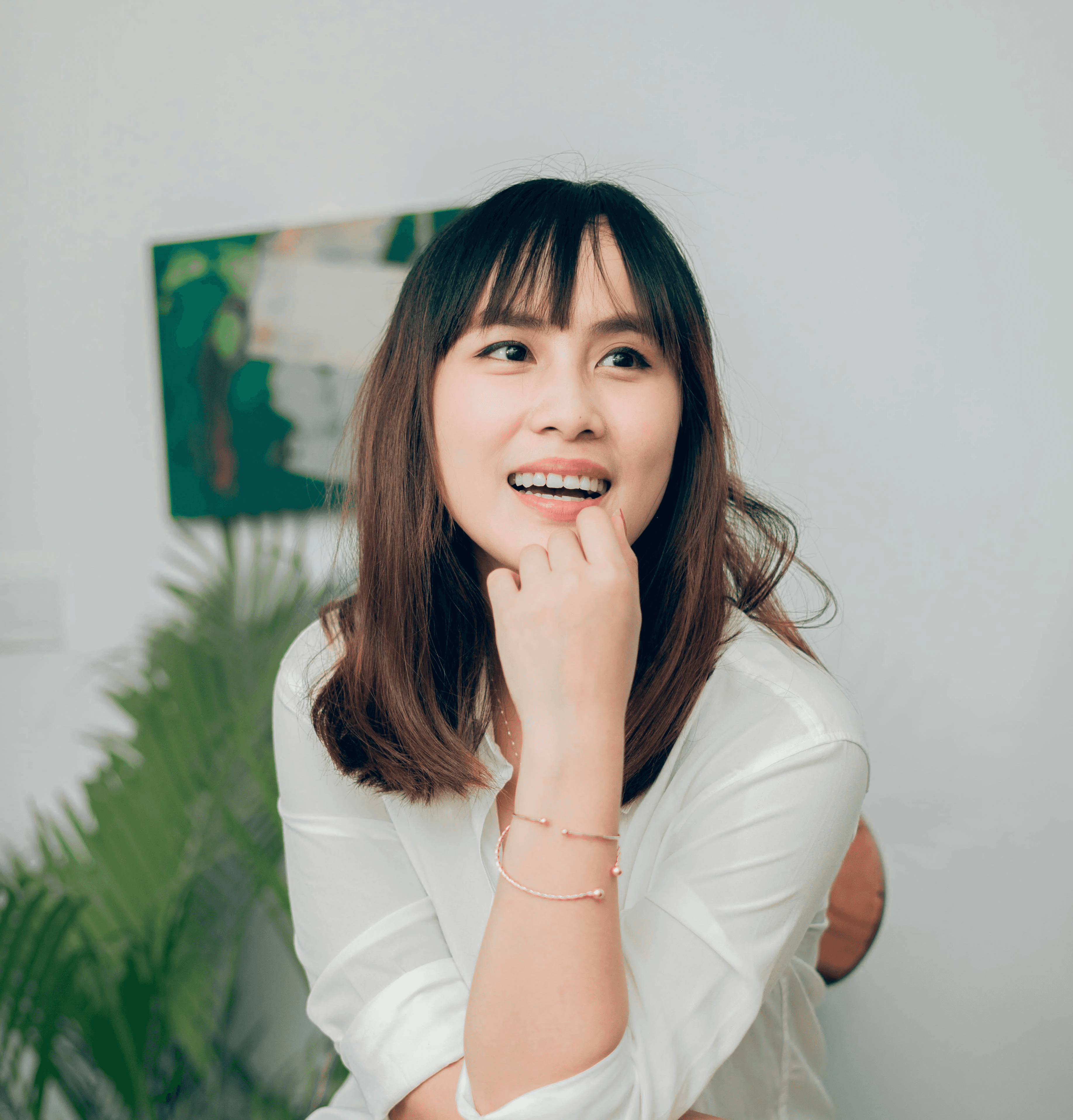 woman in white long sleeve shirt