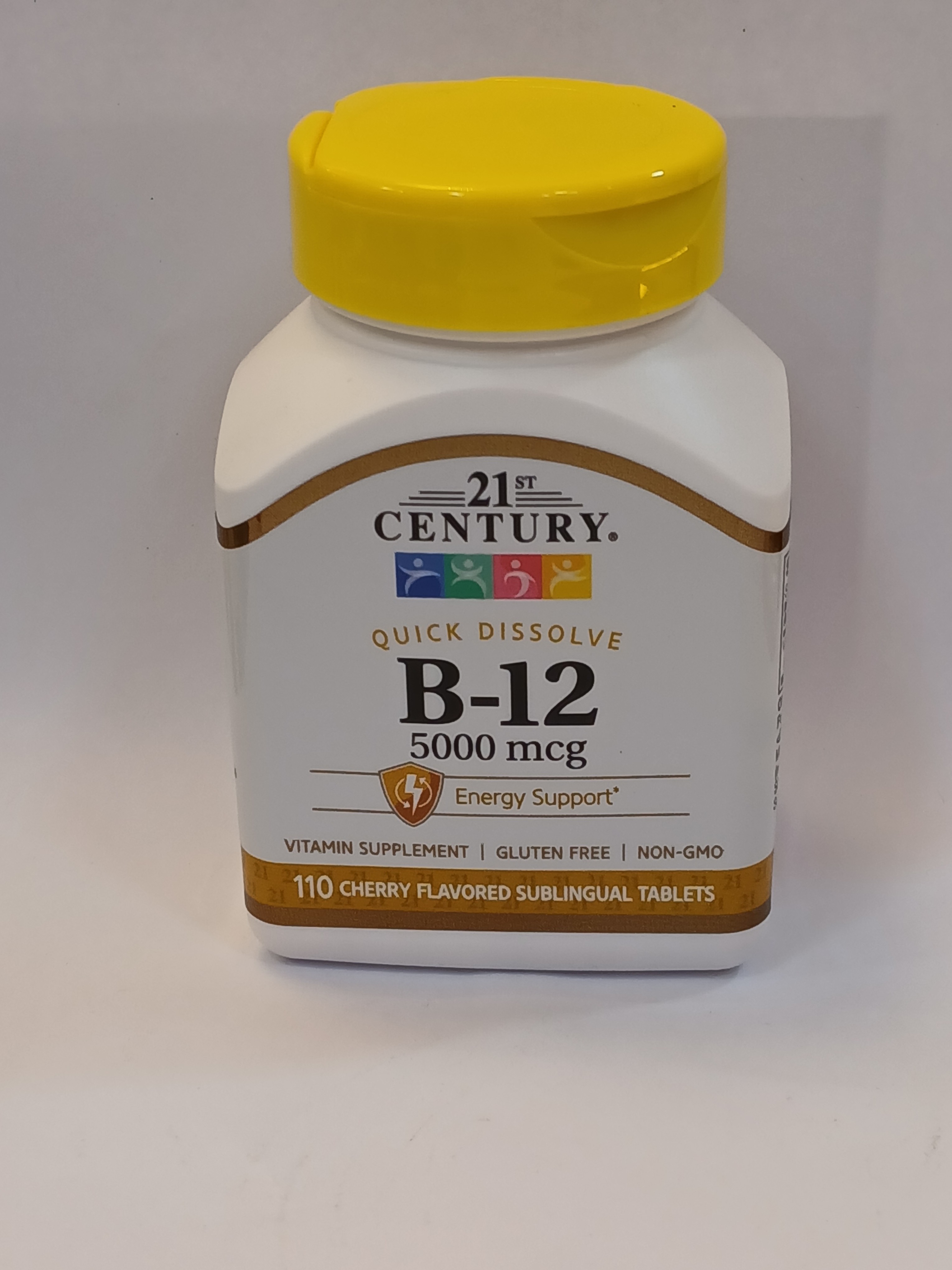 A white plastic bottle with a yellow cap contains 110 cherry-flavored sublingual tablets, labeled with "quick dissolve" and "5000 mcg" text.