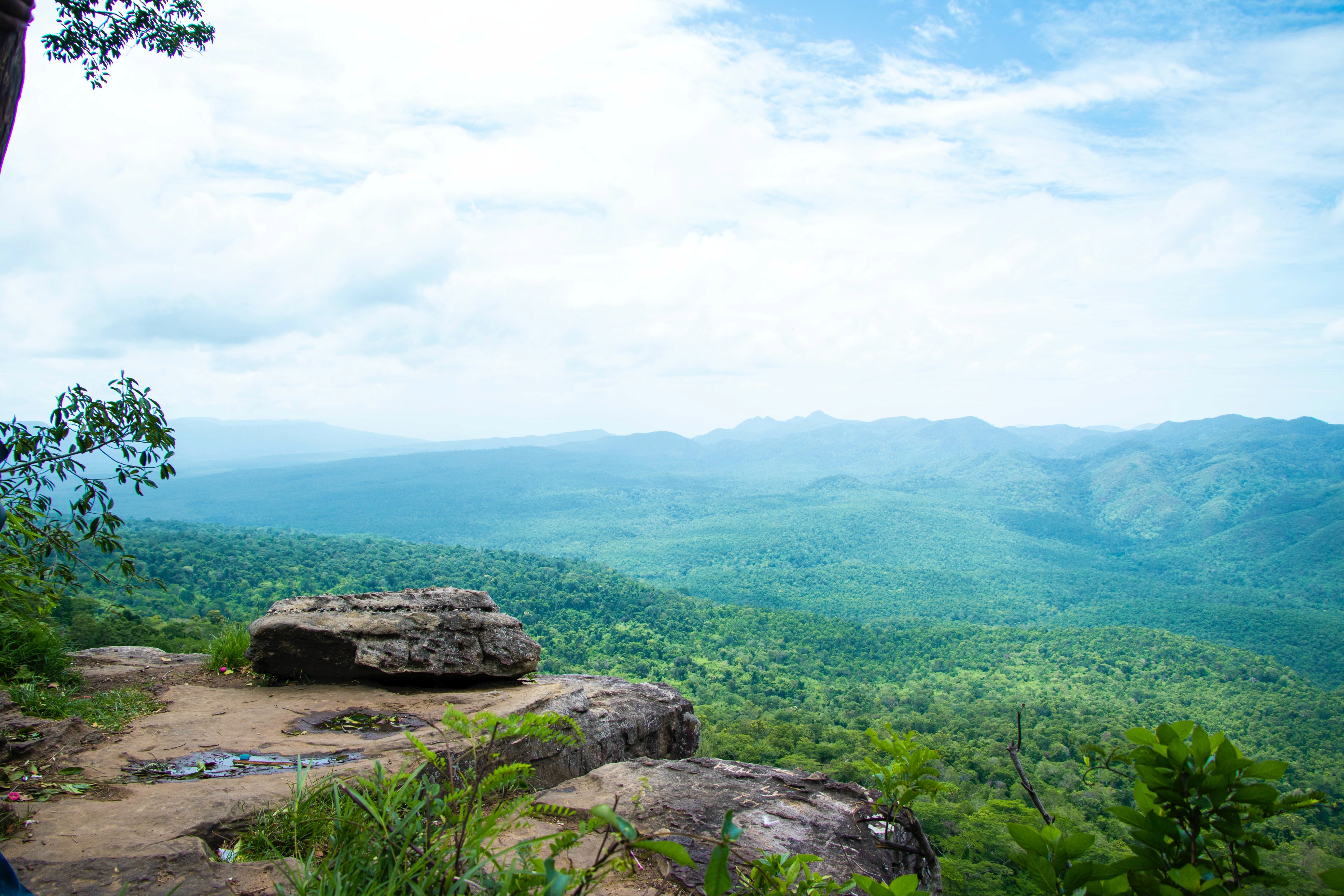 A lookout over a green forest in Cambodia