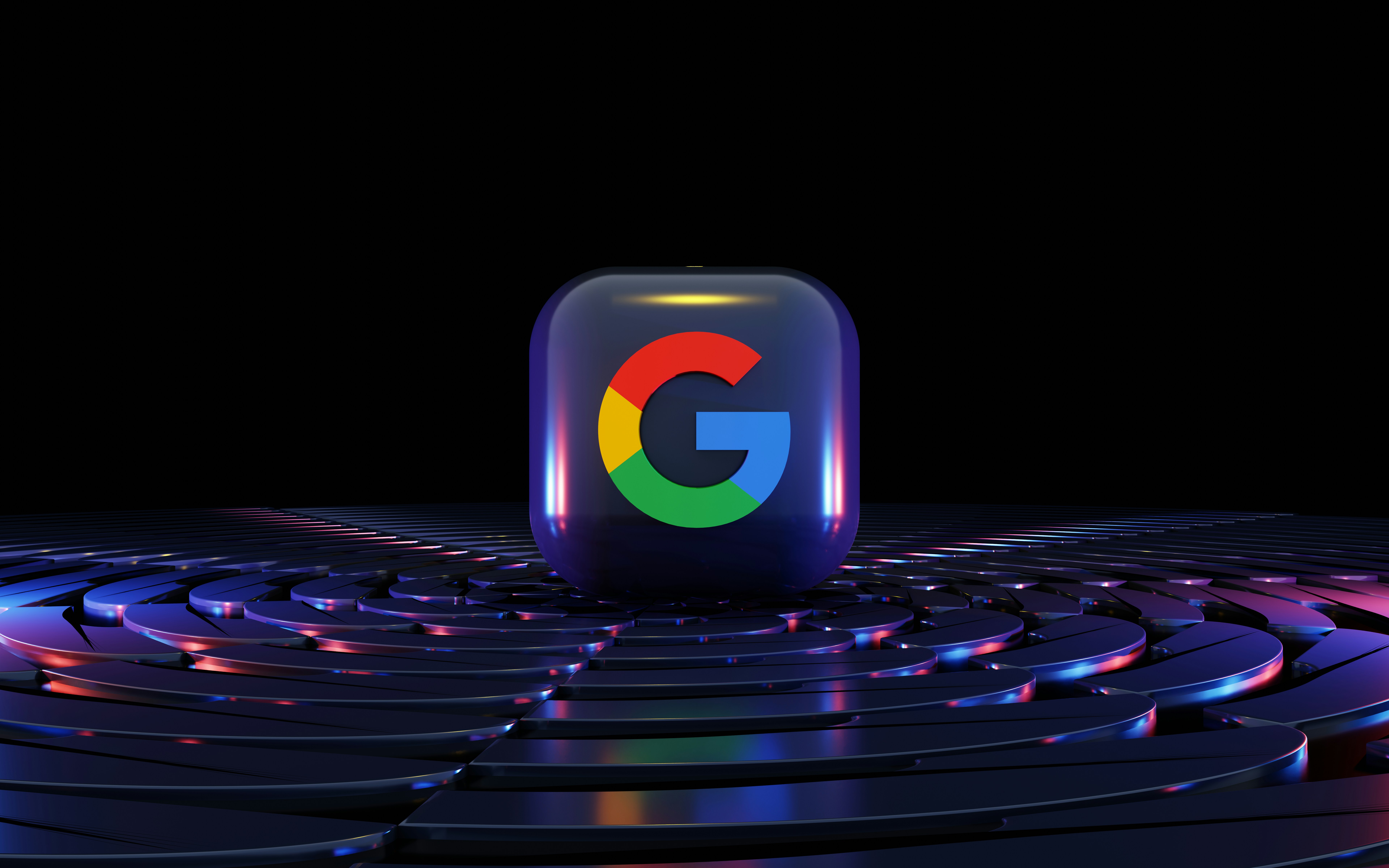 a google logo sitting on top of a computer keyboard