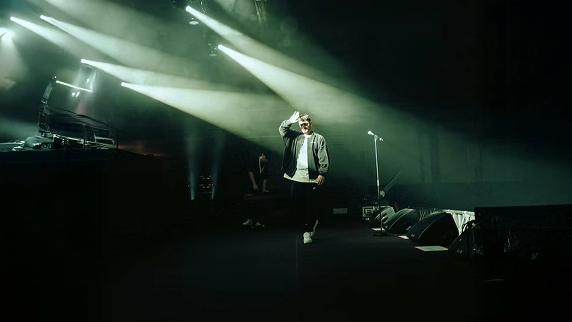 montez on stage in a big hall 