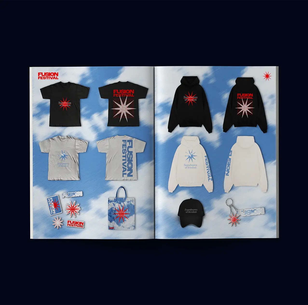 Fusion Festival merchandise laid flat on a cloud background: T-shirts, hoodies, a tote bag, a cap and keyrings