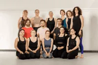 a street filled with lots of traffic next to tall buildings