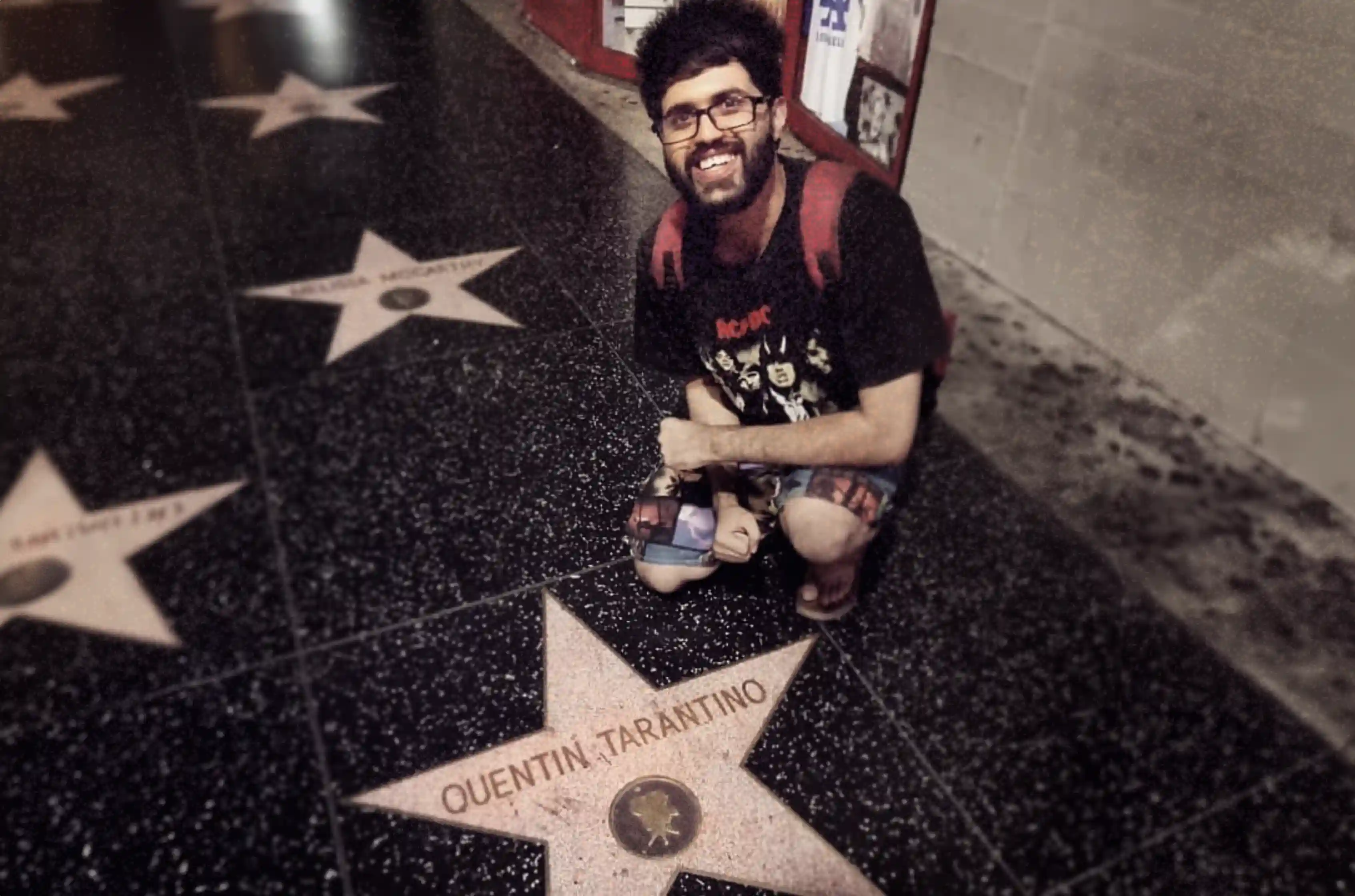 nishant dsouza with quentin tarantino hollywood walk of fame