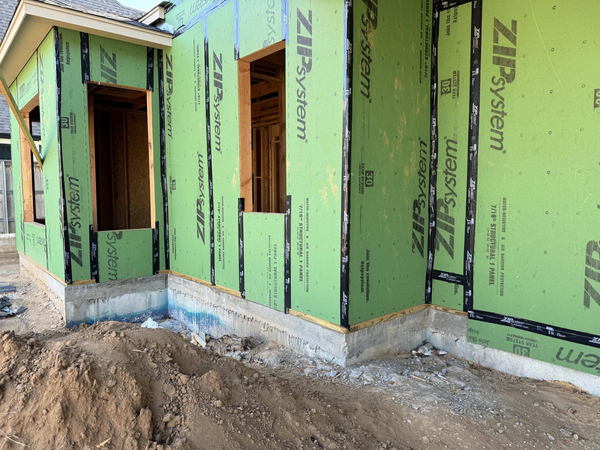Interior of a warm, modern café rendered in line-art style with high ceilings, pendant lighting, and wood and metal furnishings.