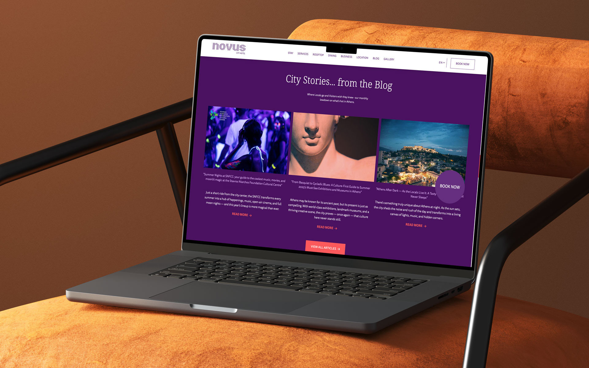 Digital application of the Novus City Hotel website on a laptop screen