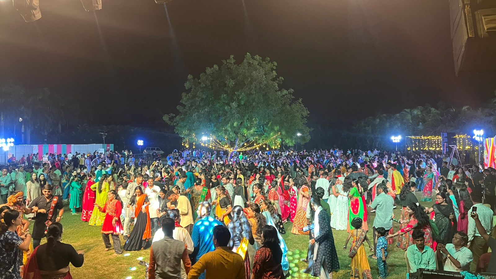 crowd of people sitting on chairs inside room