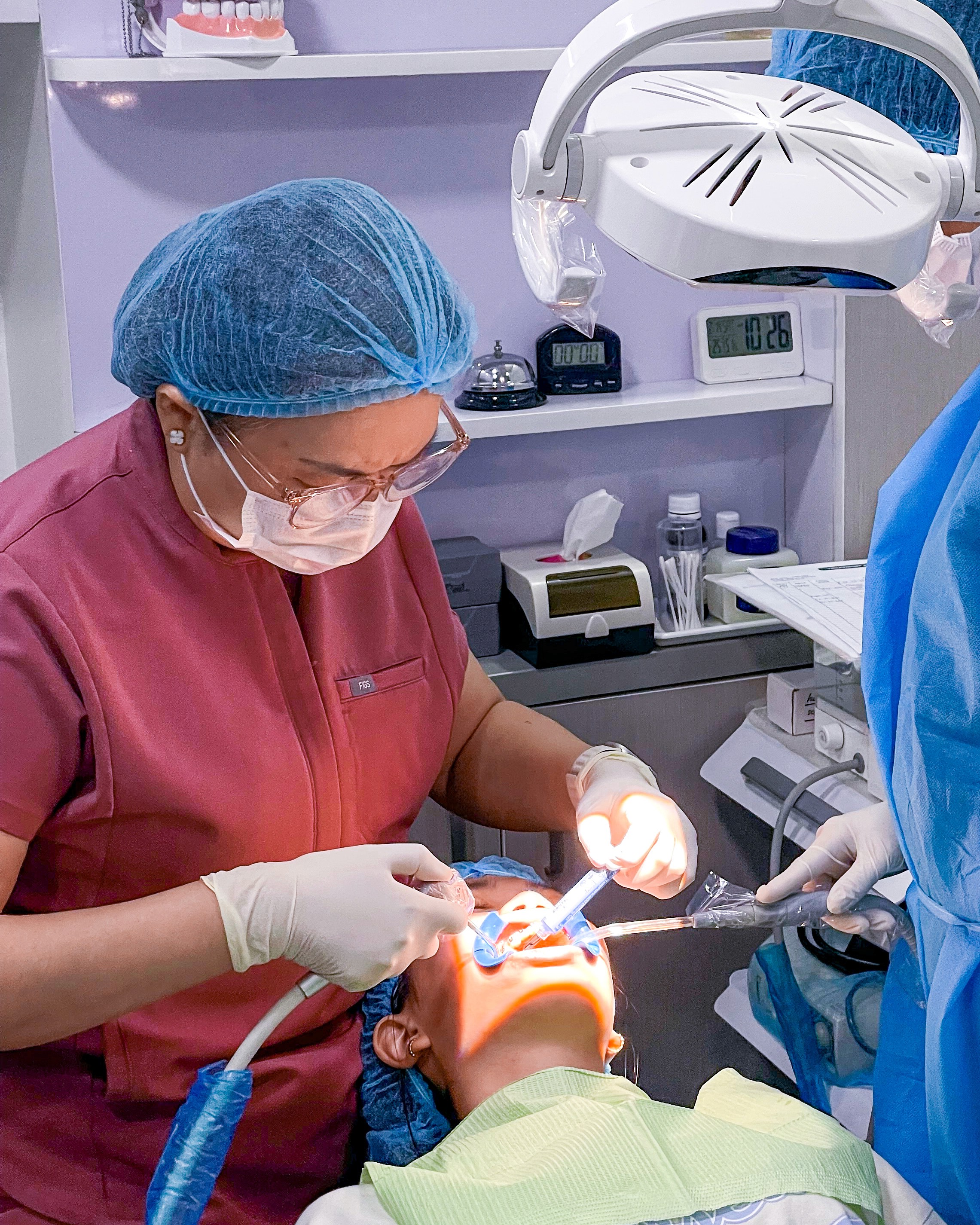 Dental team group photo with arts.