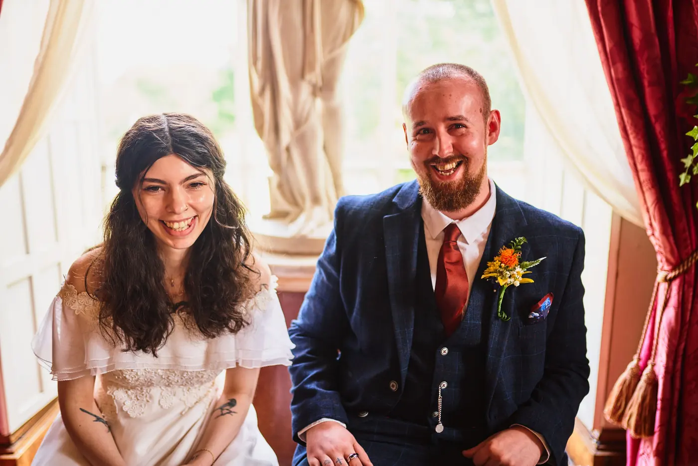 David and Scar grinning at each other while signing the register at Towneley Hall
