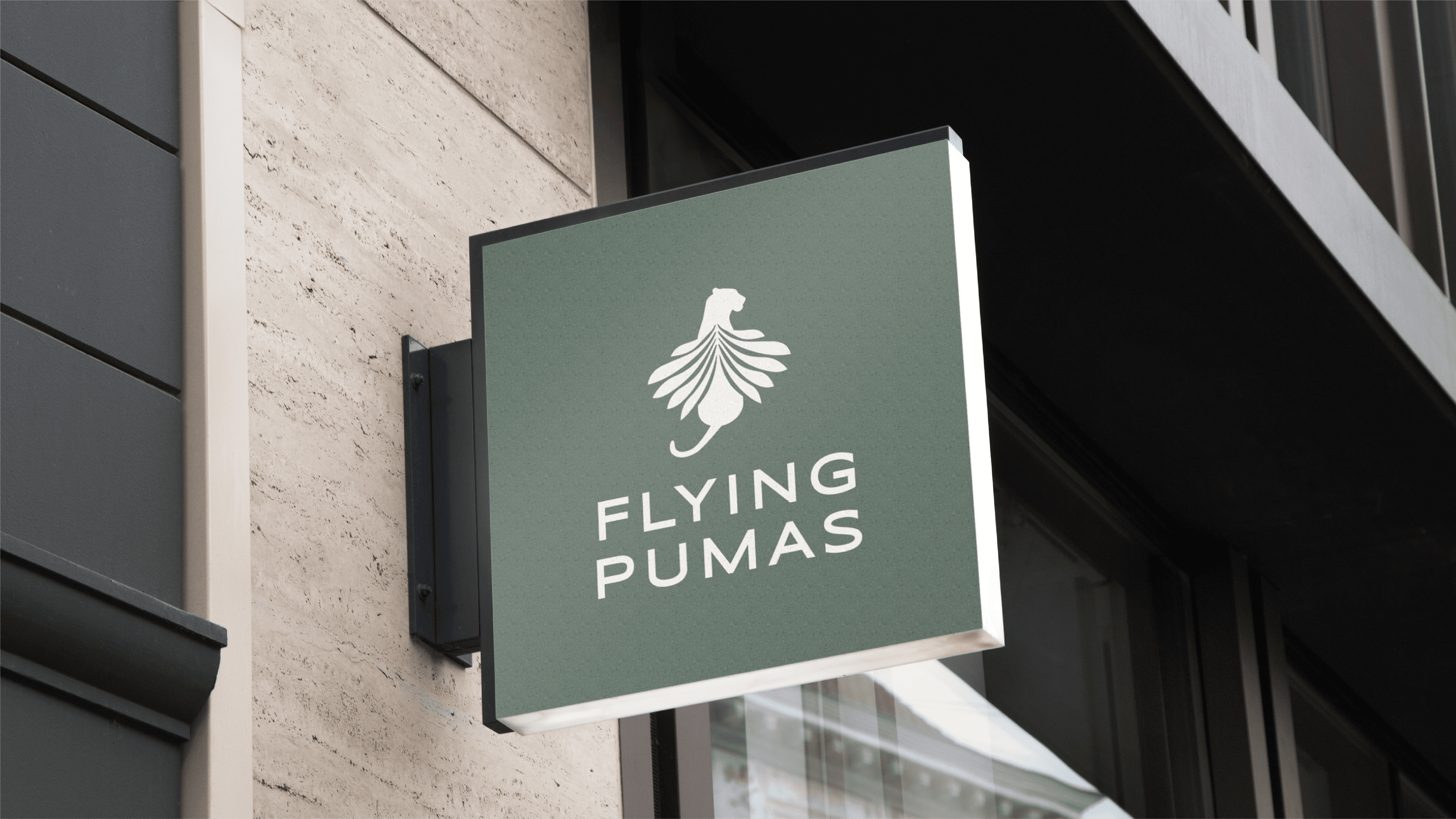 young men standing in front of a retro car