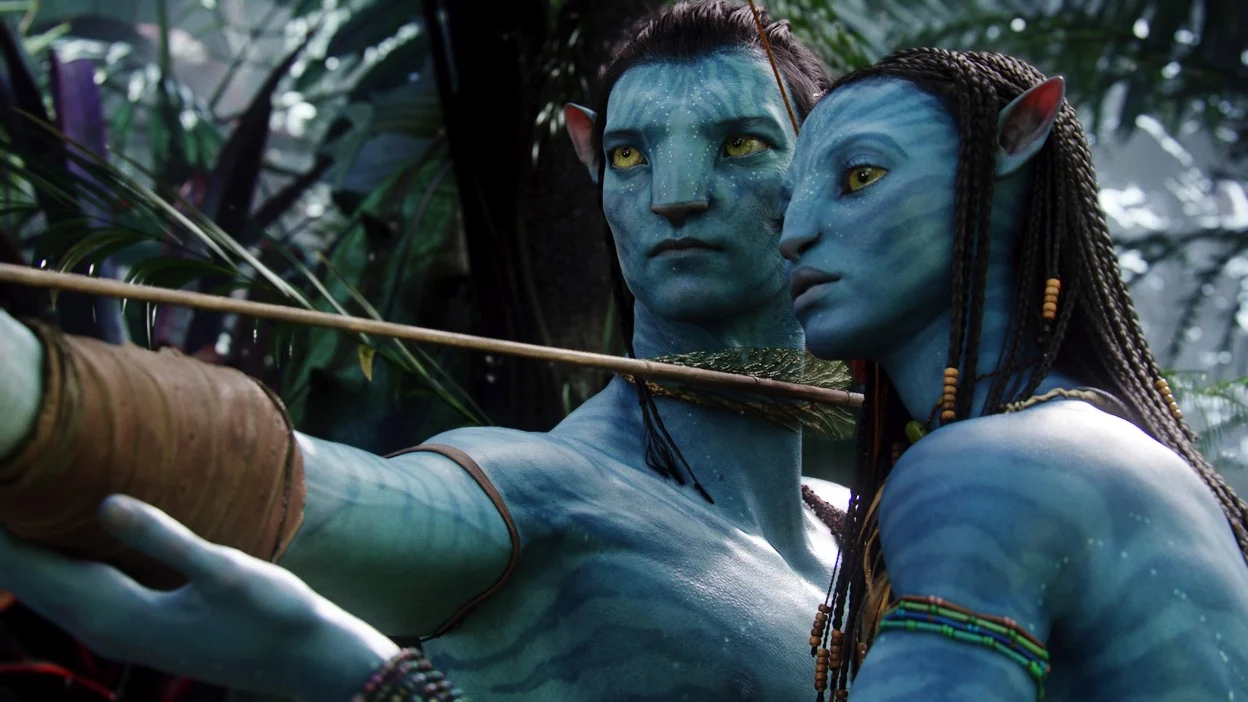 Jake Sully from 'Avatar' drawing a bow as Neytiri stands close beside him.