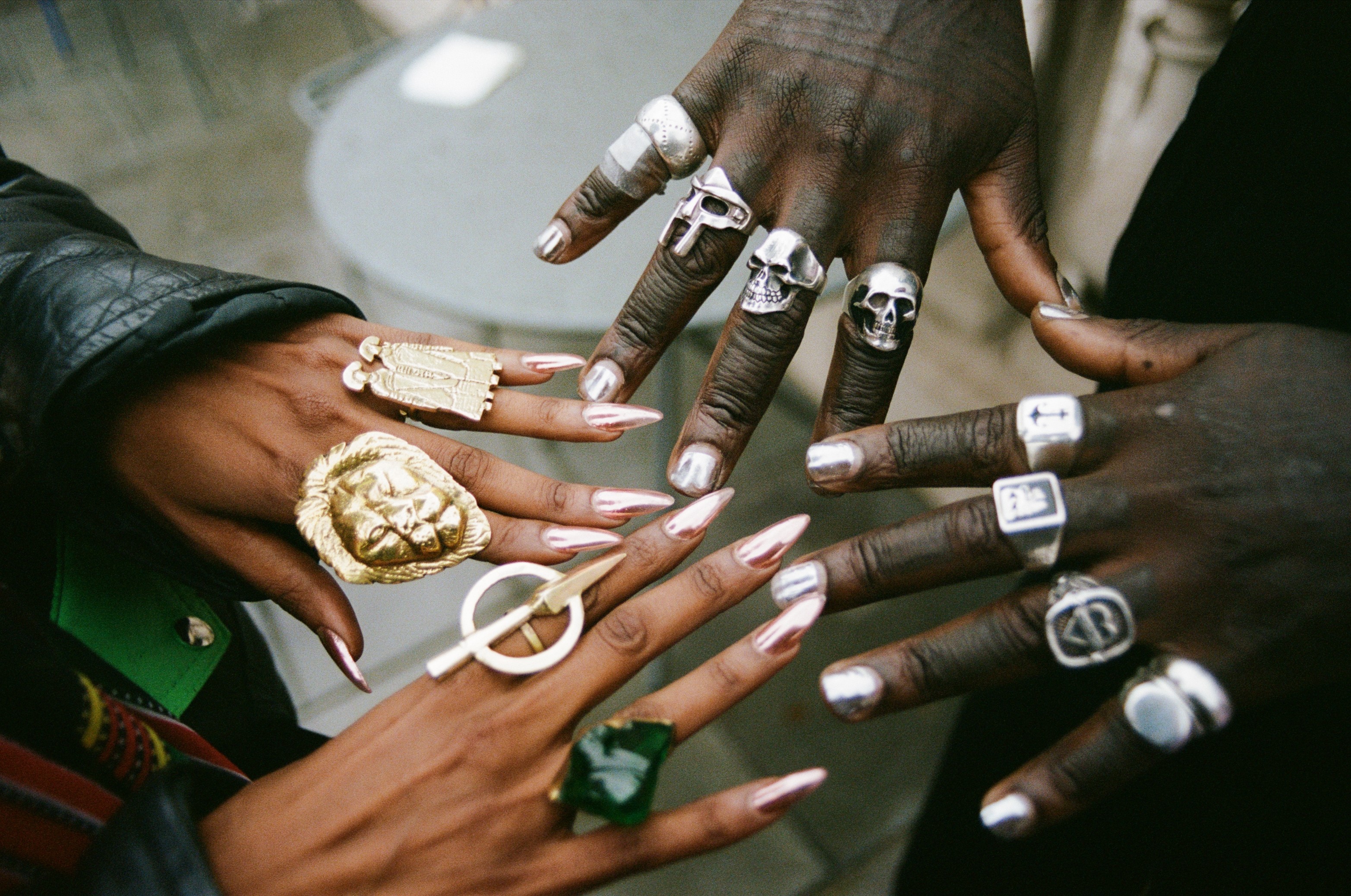 Modern skyscrapers line a busy highway in a sprawling city.