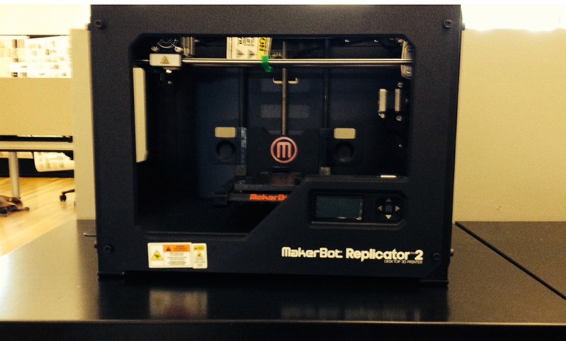 A photo of a desktop 3d printer named Maker Bot Replicator.