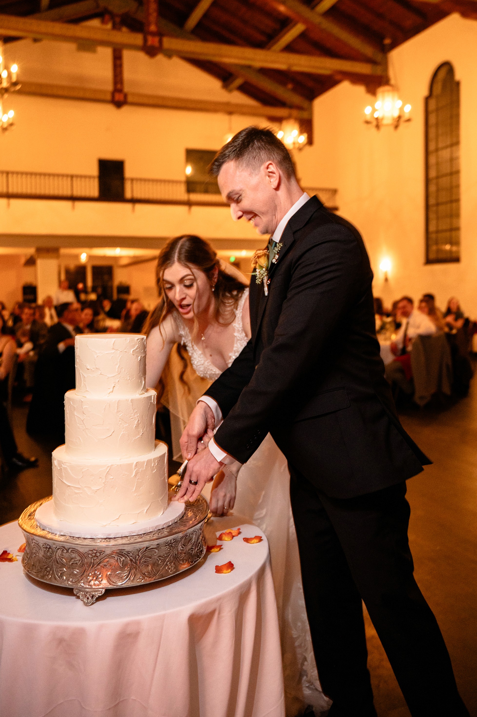 Flat lay wedding details with bouquet, rings, and sparkling bridal heels