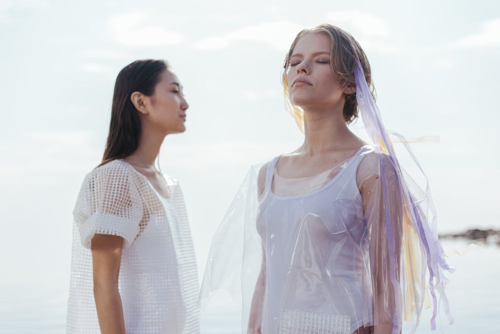 Women standing in the sun
