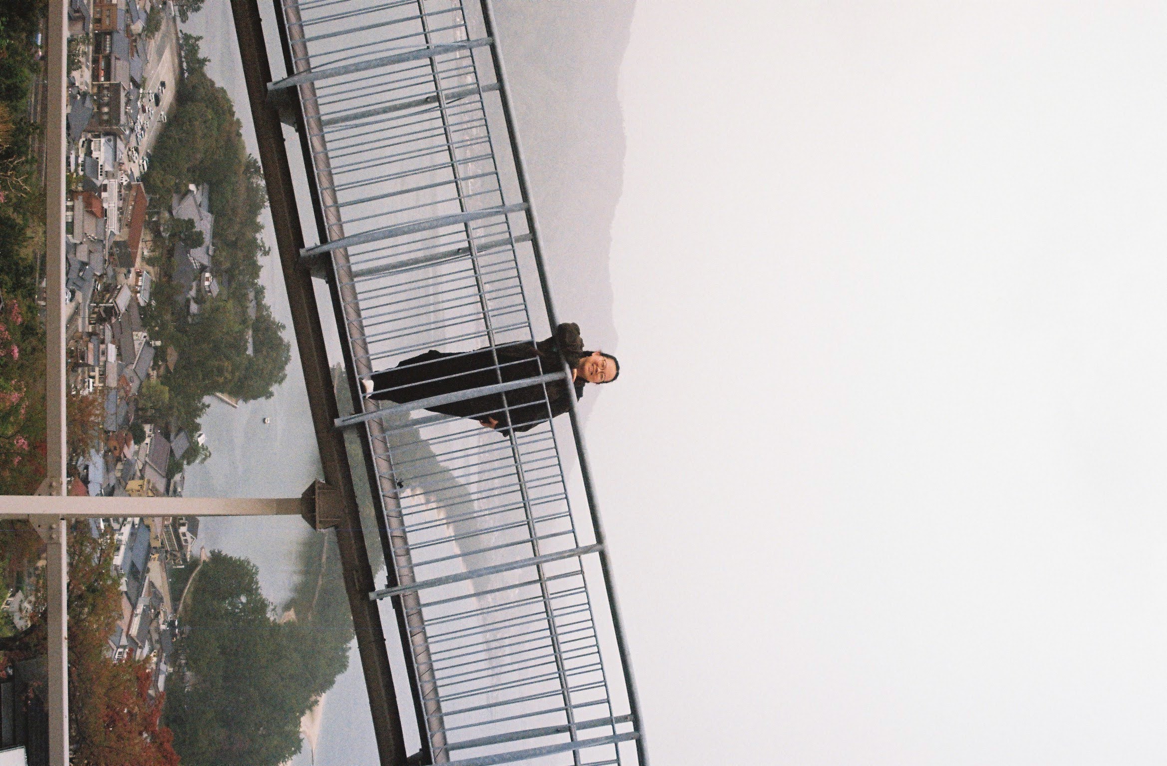 a blurry photo of a person standing in front of a wall