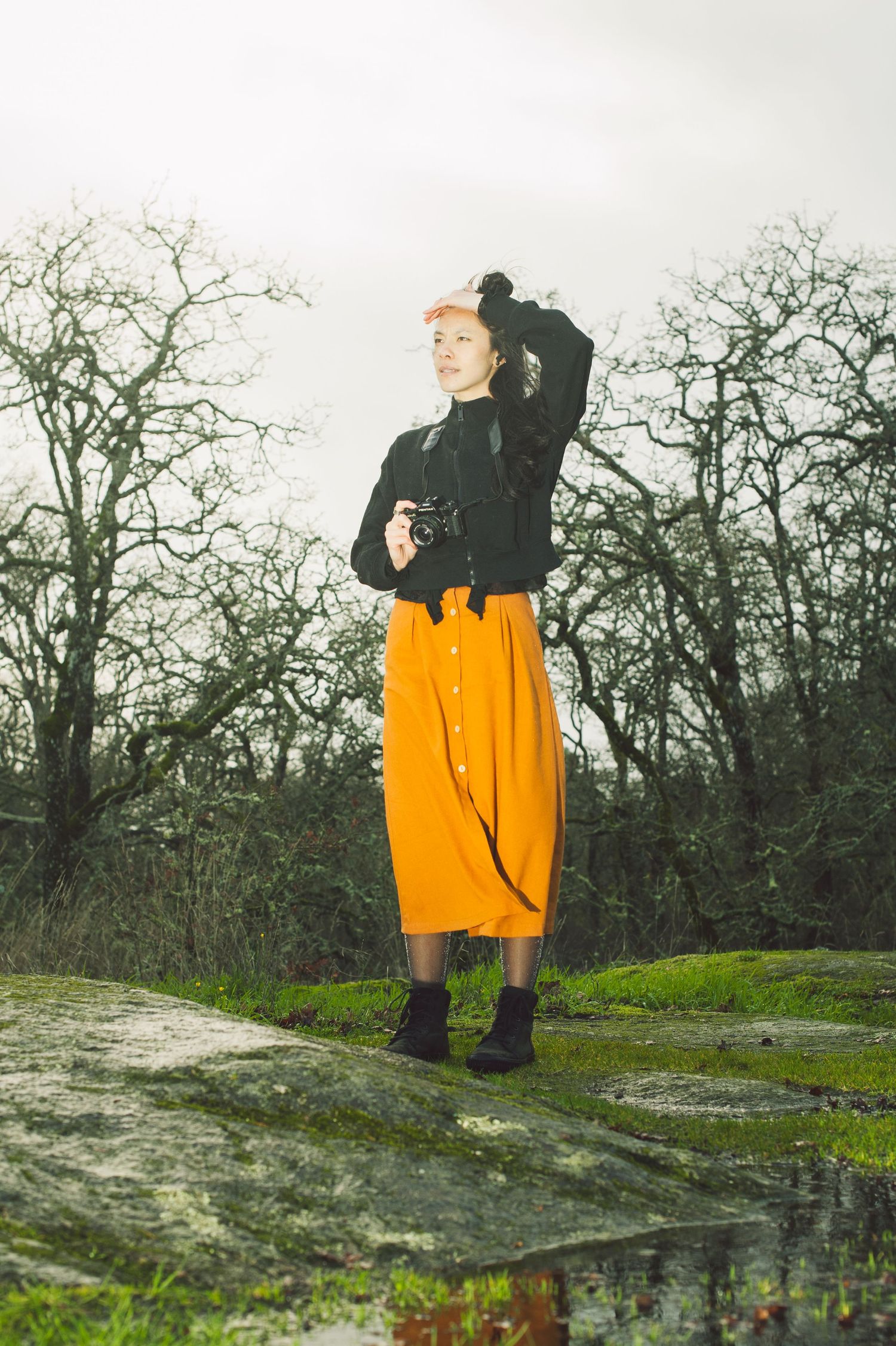 Vanessa Carson smiling in a portrait, dressed casually against a neutral background