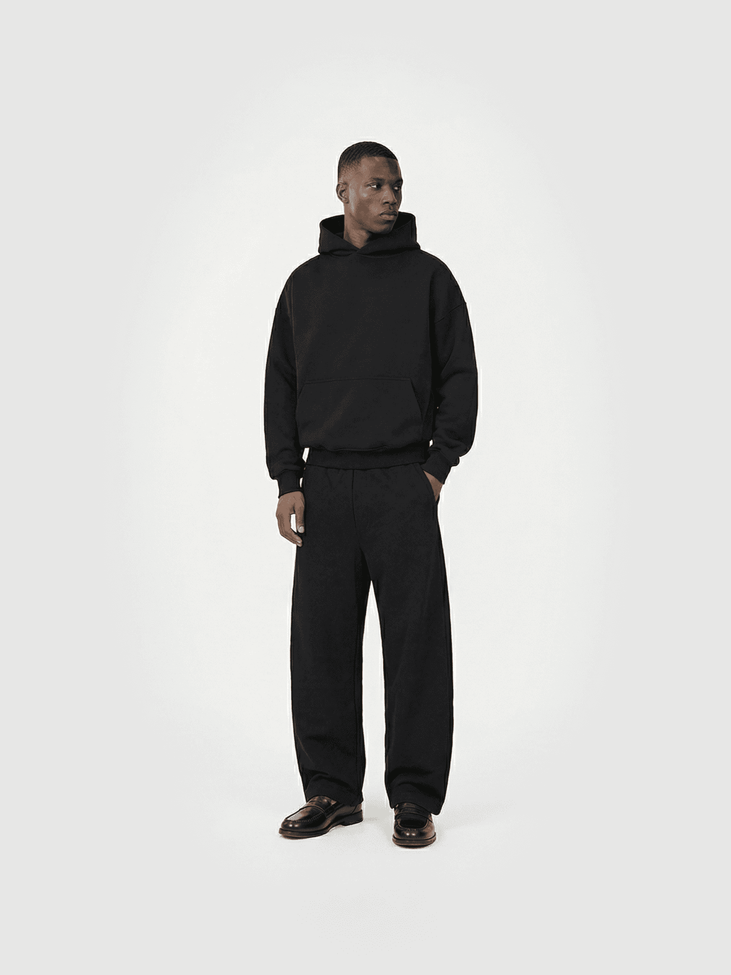 Heavyweight classic crew T-shirt in black — front view on model.