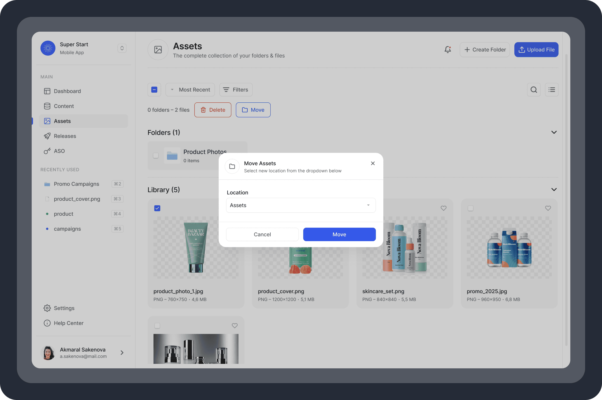 A high-fidelity UI mockup of the Assets dashboard with a "Move Assets" modal window active