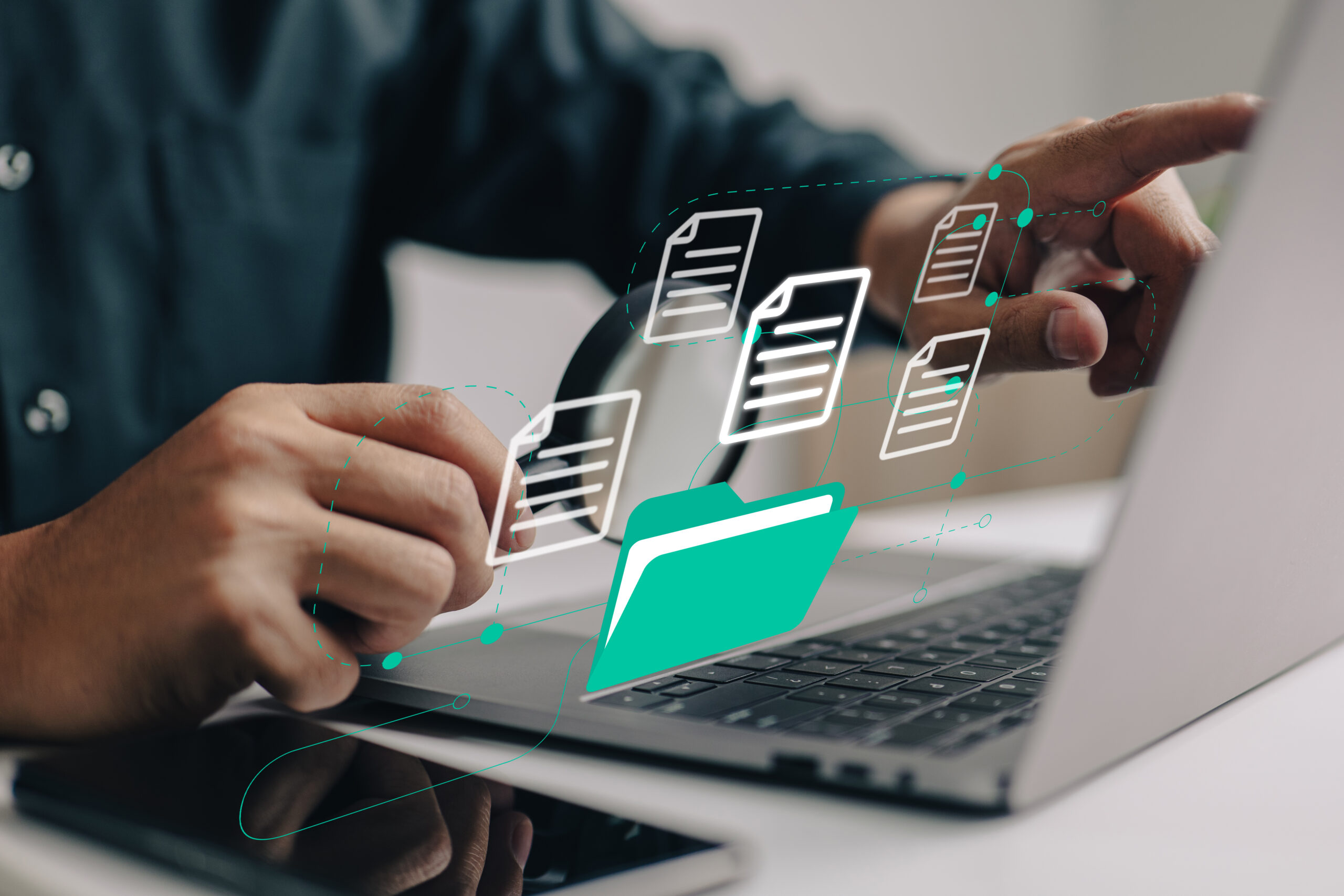 man reviewing documents - Best HR Document Management Software