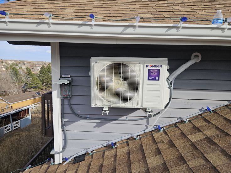 The image displays a service vehicle for MoJo Home Services, an HVAC company operating in the Denver Metro area