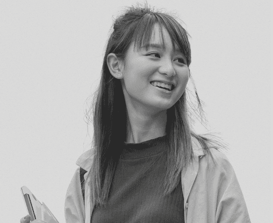 a close up of a red and yellow object on a black background