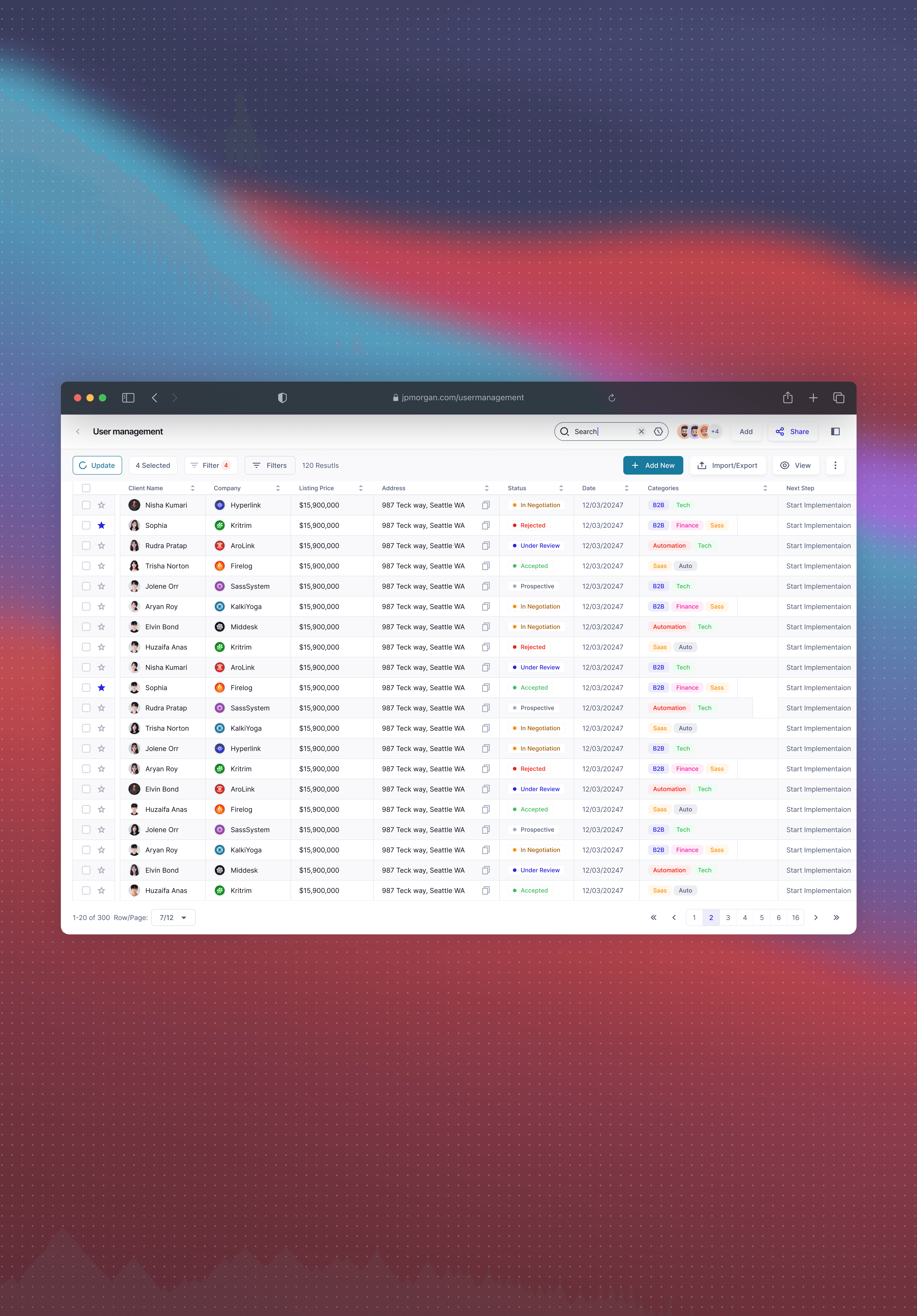 two ladies looking at a laptop and smiling