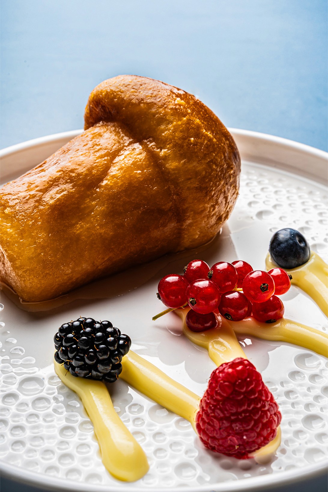 A smiling woman throwing a basketball