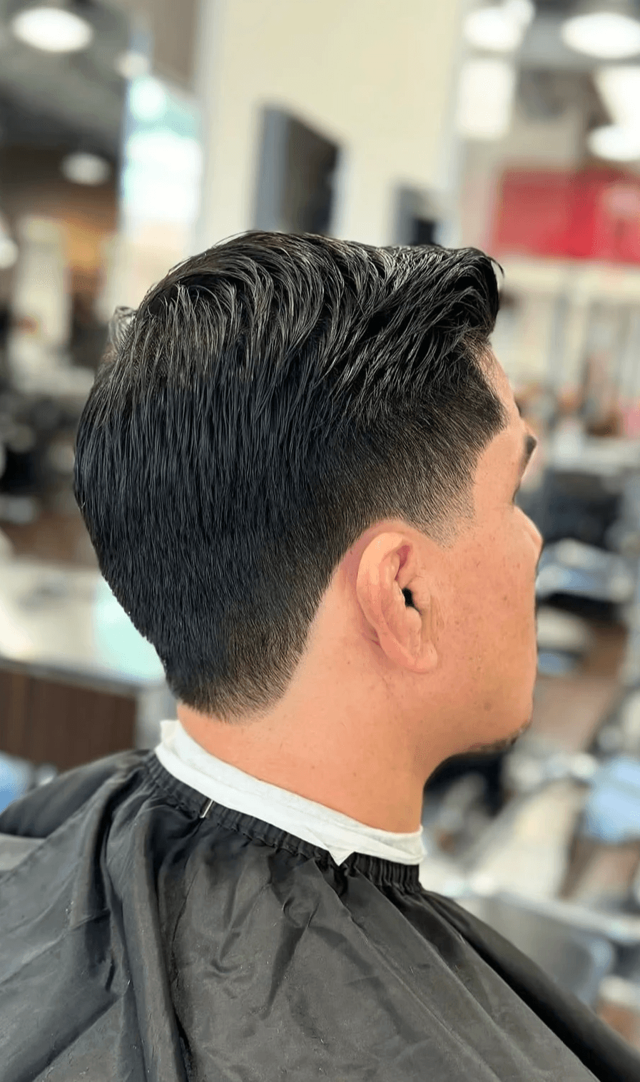 Professional men’s haircut with clean lines and a polished finish, showcasing expert grooming services offered by Barber.CLP in West Hollywood.