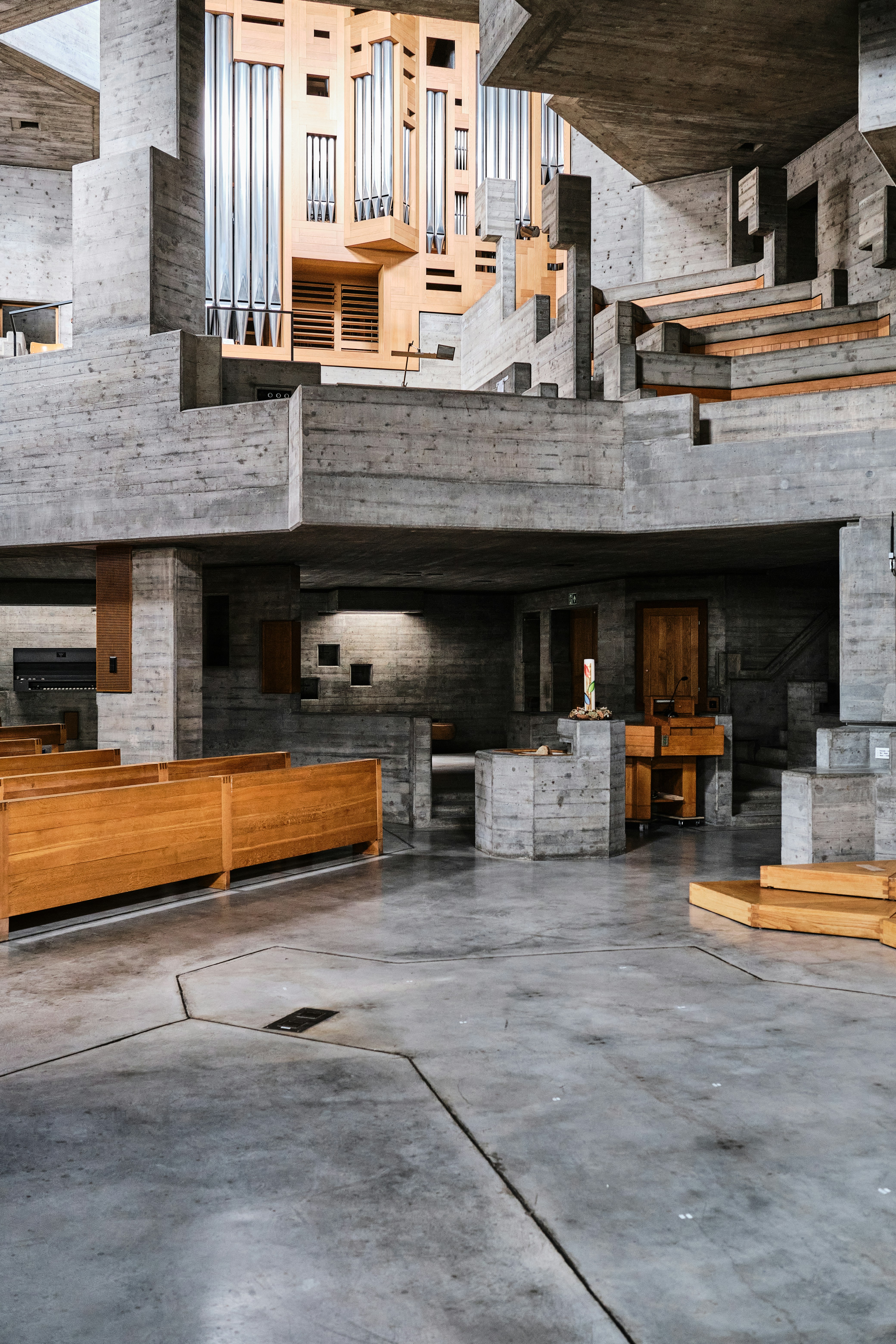 a church with pews and a pipe organ