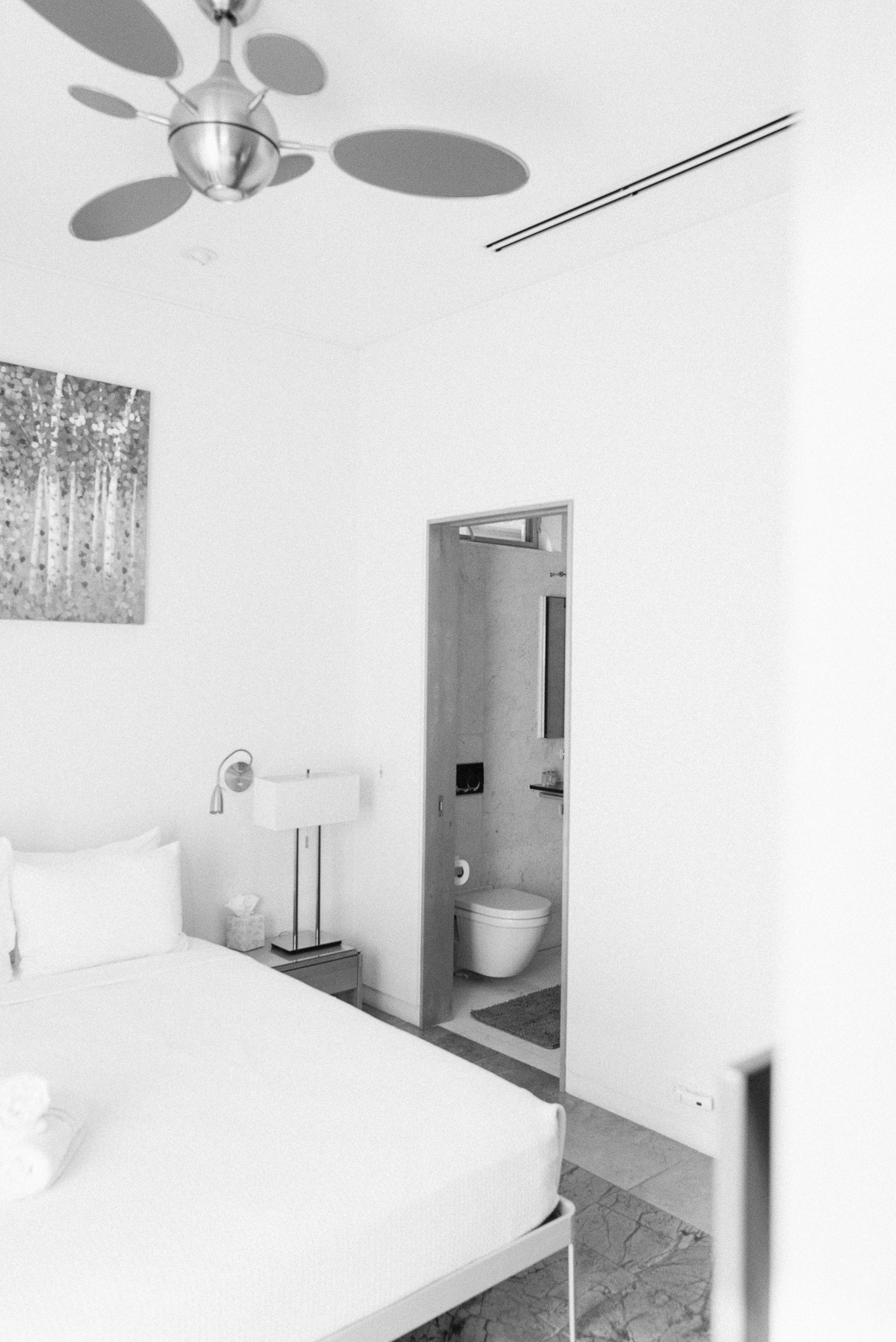 bedroom with minimalist decor, blending style and comfort in contemporary Key West lodging