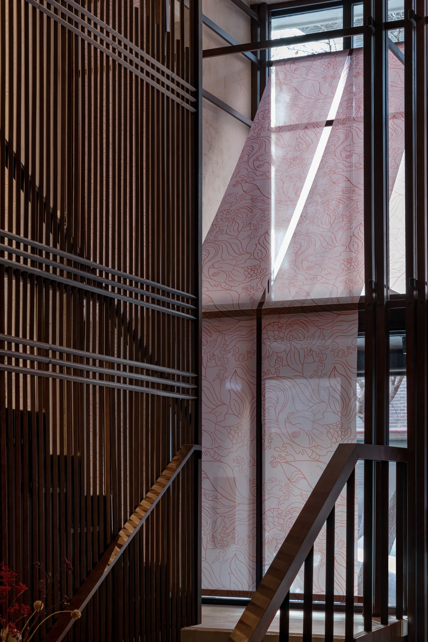 Man in cowboy hat and sunglasses poses outdoors
